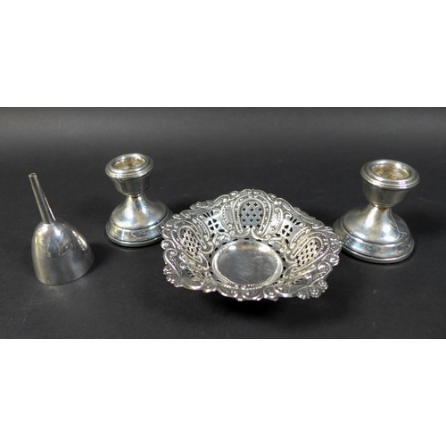 27 - Three pieces of silver, comprising a pair of dwarf candle holders, marked W I Broadway & Co, Birming... 