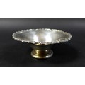 An ERII silver dish with scalloped edge, Mappin and Web Ltd., Sheffield 1952, 2.12 toz, 10.5 by 4cm ... 