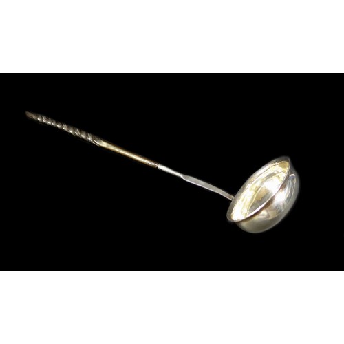 59 - A George III toddy ladle with ebony twist handle, with a 1787 George III shilling to dish, overall w... 