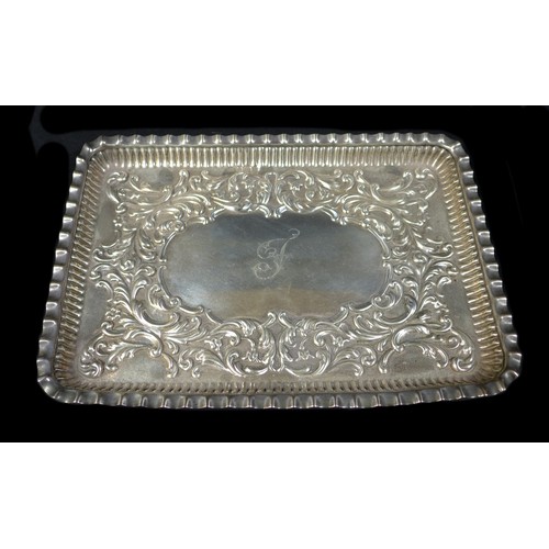 89 - A silver dressing table tray inscribed 'J' to centre and marked Birmingham 1900, together with a pai... 