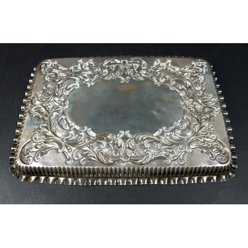 89 - A silver dressing table tray inscribed 'J' to centre and marked Birmingham 1900, together with a pai... 