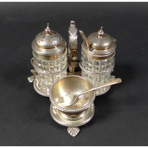 50 - A Victorian cruet set, standing on three pad feet with scrolling handle, Henry Wilkinson & Co, Sheff... 