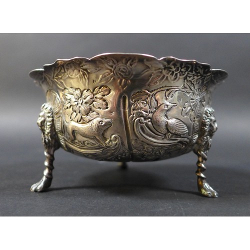58 - A Victorian silver bowl decorated with birds and animals with lion-topped legs, Wakely & Wheeler, Lo... 