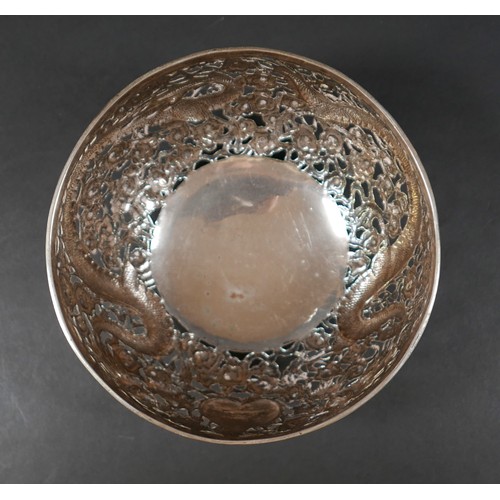 101 - A Chinese Export silver bowl, circa 1900, the body pierced and decorated in relief with a pair of fa... 