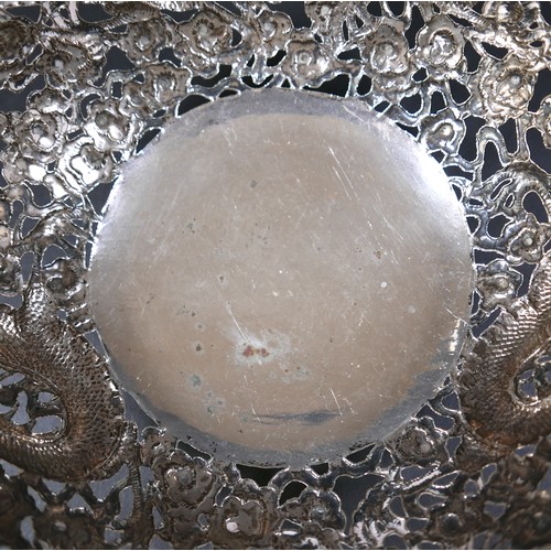 101 - A Chinese Export silver bowl, circa 1900, the body pierced and decorated in relief with a pair of fa... 