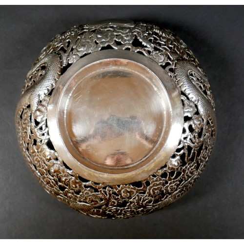 101 - A Chinese Export silver bowl, circa 1900, the body pierced and decorated in relief with a pair of fa... 