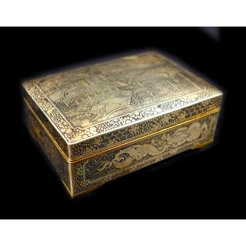 102 - A Japanese Komai type box, with hinged cover and stay chain, the exterior finely decorated in gilt w... 