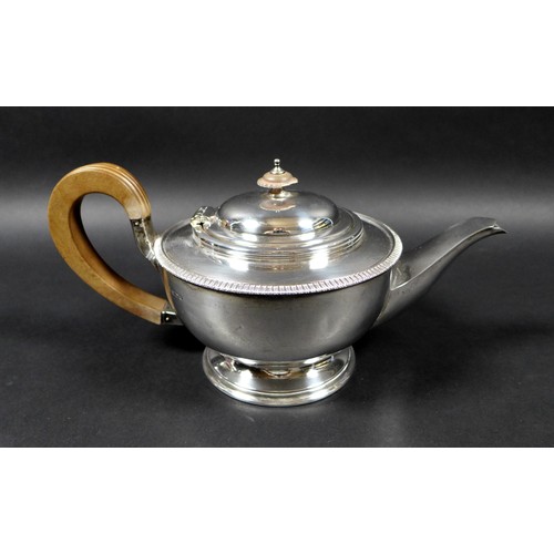 120 - A George V silver teapot and hot water pot, with gadrooned decoration, 13.5 and 19.5cm high, Cooper ... 