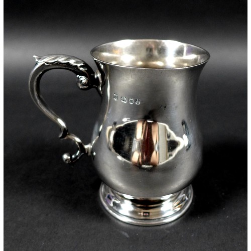 24 - A small George V / VI silver tankard, of baluster form with foliate thumb rest, probably M Beaver Lt... 