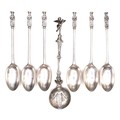 A set of six silver teaspoons, with apostle terminals, Mappin & Webb, together with an 800 silver fa... 