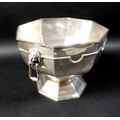 A George V silver pedestal bowl, of with octagonal rim tapering to a pedestal foot, twin lion’s head... 