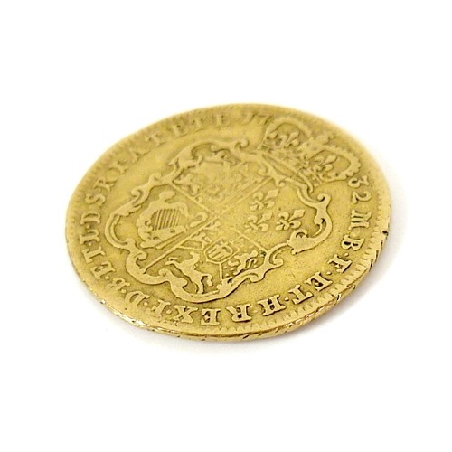 176 - A George II gold guinea, 1732, obverse with George II young head above EIC, reverse with quartered s... 