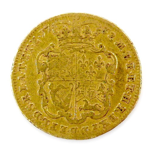 176 - A George II gold guinea, 1732, obverse with George II young head above EIC, reverse with quartered s... 