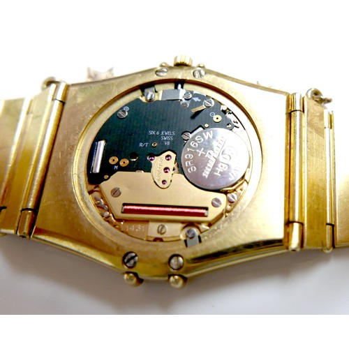 231 - An 18K yellow gold Omega Constellation Manhattan Chronometer gentleman's wristwatch, model 198.0140,... 