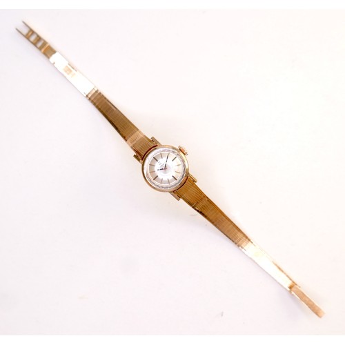 223 - An Omega 18K gold cased lady's wristwatch, circa 1960s, model 511.042, the circular champagne dial w... 