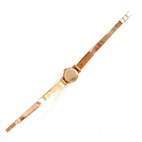 223 - An Omega 18K gold cased lady's wristwatch, circa 1960s, model 511.042, the circular champagne dial w... 