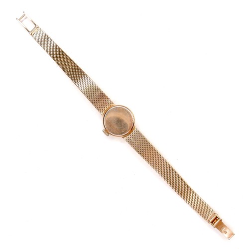 224 - An Omega 18K gold cased lady's wristwatch, circa 1970s, model 542.645, the circular gold dial with g... 