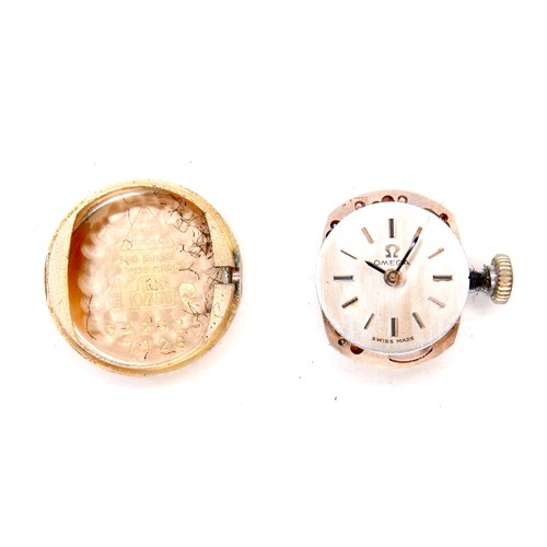 224 - An Omega 18K gold cased lady's wristwatch, circa 1970s, model 542.645, the circular gold dial with g... 