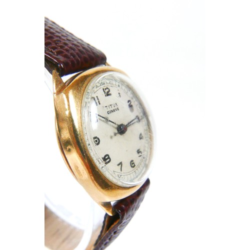 217 - A Titus Geneve 9ct gold cased gentleman's wristwatch, circa 1948 with circular cream dial, black Ara... 