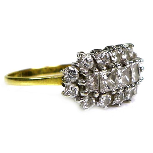 384 - A yellow gold and diamond dress ring, set with a row of five graduating sqaure and rectangular cut s... 