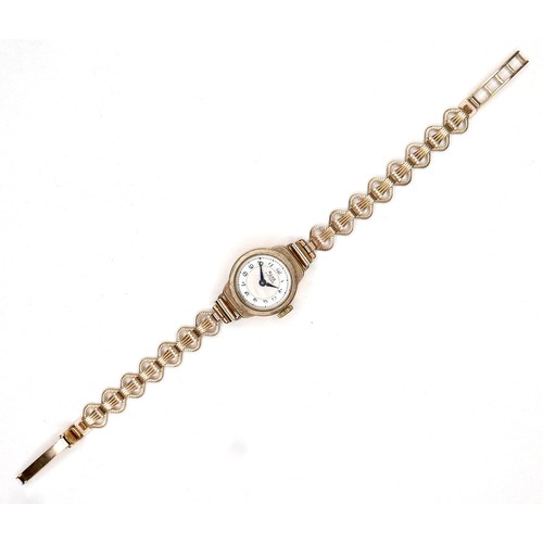 276 - A 9ct gold Rone lady's cocktail wristwatch, with Arabic dial, 12mm dial, case 20mm, on a 9ct gold br... 