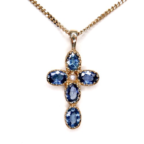 275 - A pale blue sapphire and pearl inlaid cross shaped pendant, set with a single pearl 18mm diameter, a... 