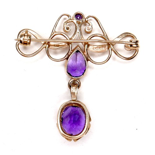 254 - An Edwardian 9ct gold amethyst and diamond brooch, largest amethyst 9mm by 7mm, a pear shaped cut am... 