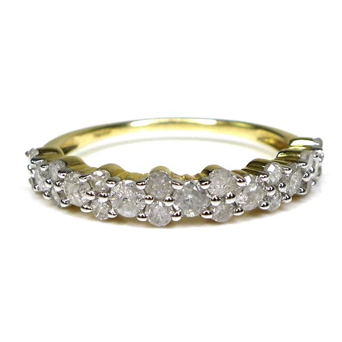 240 - A 9ct gold and diamond half eternity ring, the brilliant cut stones of varying size set in a bubble ... 