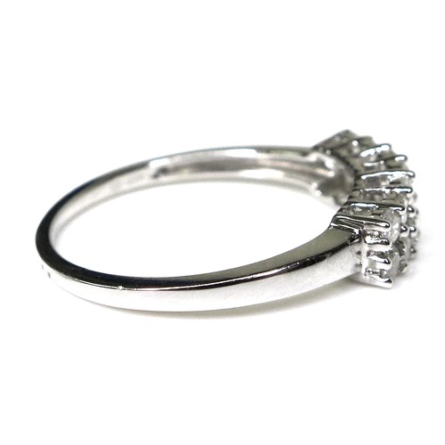 242 - A 9ct white gold and diamond ring, set with two rows of brilliant cut diamonds, size N/O, 1.9g.