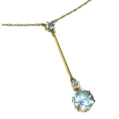 285 - An Edwardian 15ct gold, aquamarine and diamond necklace, the drop pendant set with a round cut aquam... 