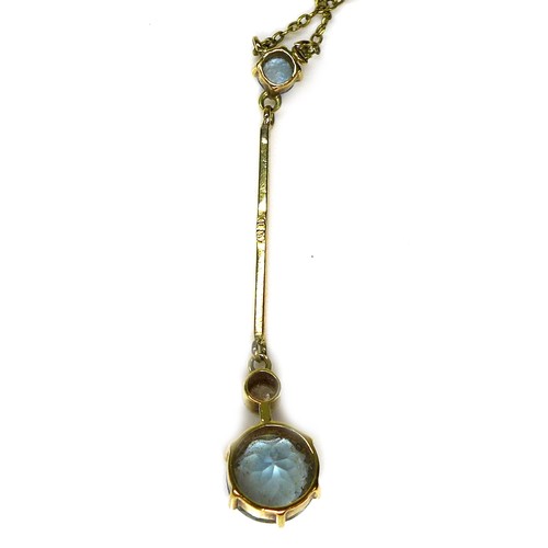 285 - An Edwardian 15ct gold, aquamarine and diamond necklace, the drop pendant set with a round cut aquam... 