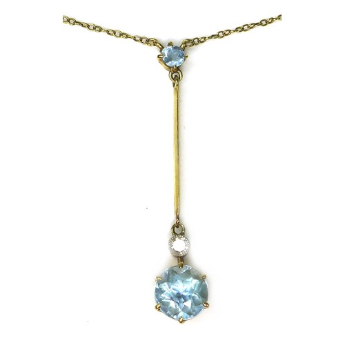 285 - An Edwardian 15ct gold, aquamarine and diamond necklace, the drop pendant set with a round cut aquam... 