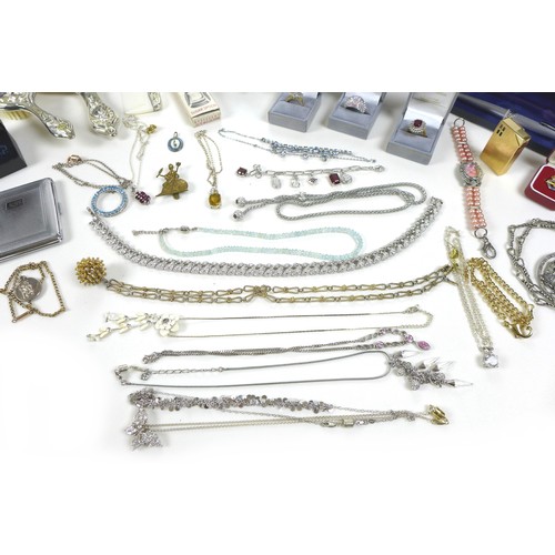 246 - A large collection of costume jewellery, including bead and simulated pearl necklaces, earrings, Swa... 