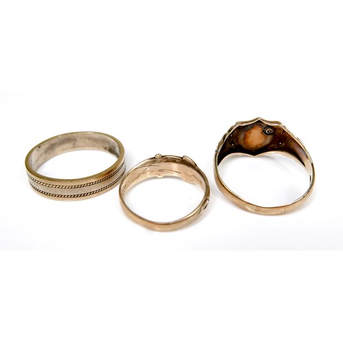 279 - A group of three gold rings, the first a 14ct bi-colour gentleman's ring, size T/V, 4.4g, the second... 