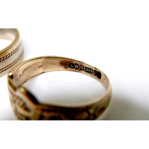 279 - A group of three gold rings, the first a 14ct bi-colour gentleman's ring, size T/V, 4.4g, the second... 