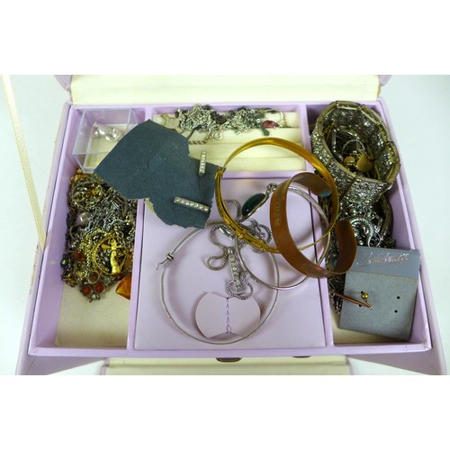 282 - A large collection of costume jewellery, including a silver bracelet with heart padlock charm, dress... 