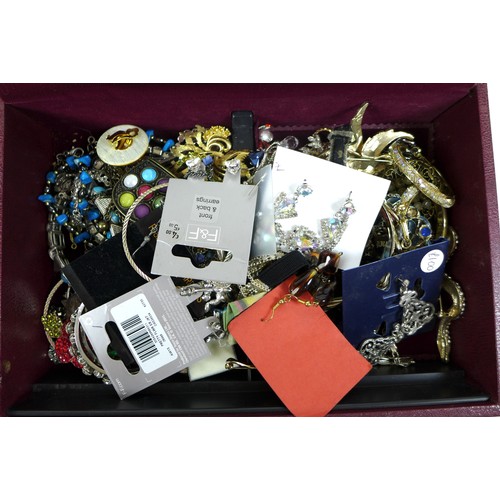 282 - A large collection of costume jewellery, including a silver bracelet with heart padlock charm, dress... 