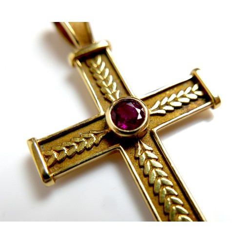 375 - An 18ct gold Theo Fennell cross pendant set with a round cut ruby to the centre, 4.0mm, hallmarked t... 