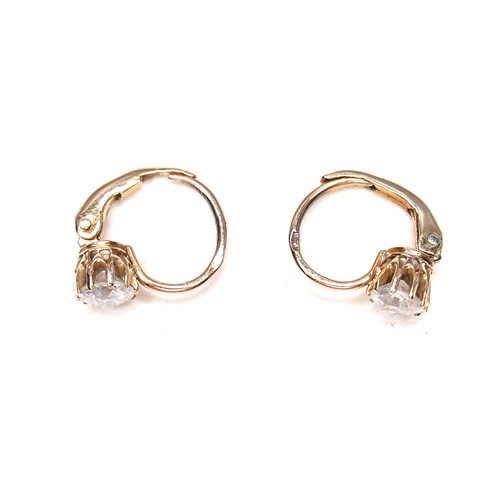 362 - A pair of diamond solitaire earrings, on fixed loop settings with hinged clasp, each brilliant cut s... 