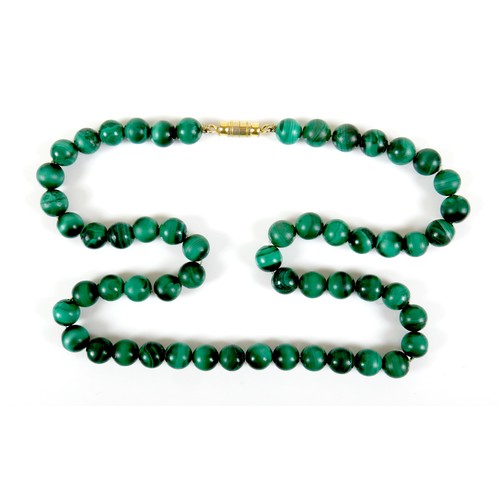 239 - A malachite bead necklace, each spherical bead 8mm, 48cm long, 60.0g.