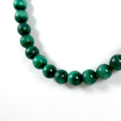 239 - A malachite bead necklace, each spherical bead 8mm, 48cm long, 60.0g.