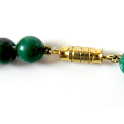 239 - A malachite bead necklace, each spherical bead 8mm, 48cm long, 60.0g.