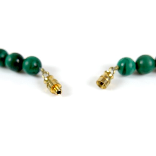 239 - A malachite bead necklace, each spherical bead 8mm, 48cm long, 60.0g.