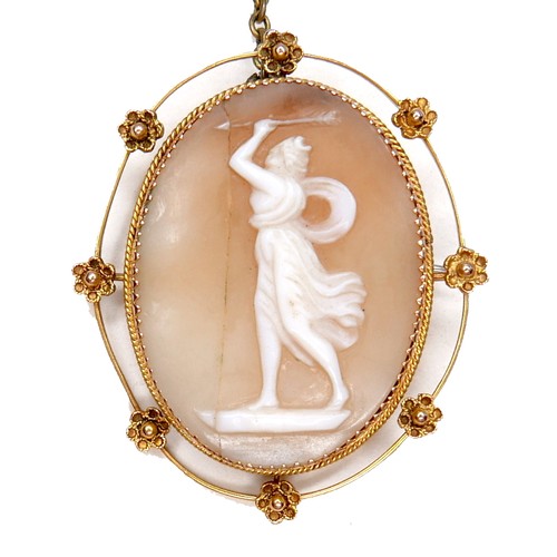 248 - A Victorian 9ct gold oval shaped cameo brooch, carved with a classical lady brandishing an arrow abo... 