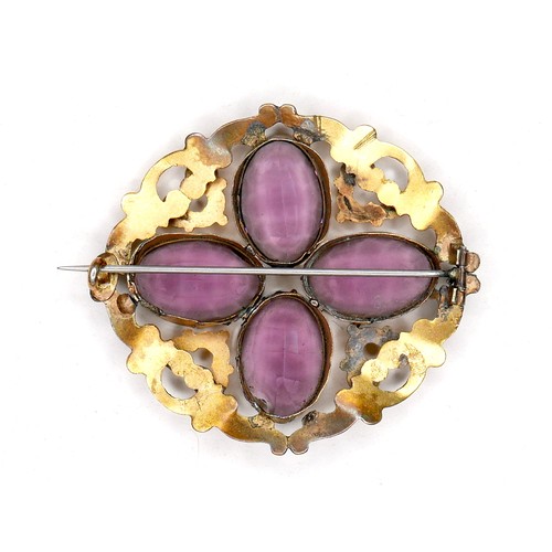 250 - A Victorian gilt brass brooch set with amethysts, the four oval stones each 18 by 12 by 6mm, and of ... 