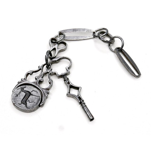 235 - A Georgian steel part fob chain, with hinged key, and cast swivel fob set with a double sided intagl... 