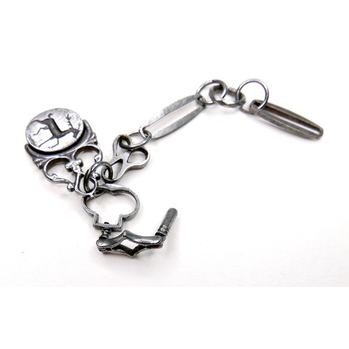 235 - A Georgian steel part fob chain, with hinged key, and cast swivel fob set with a double sided intagl... 