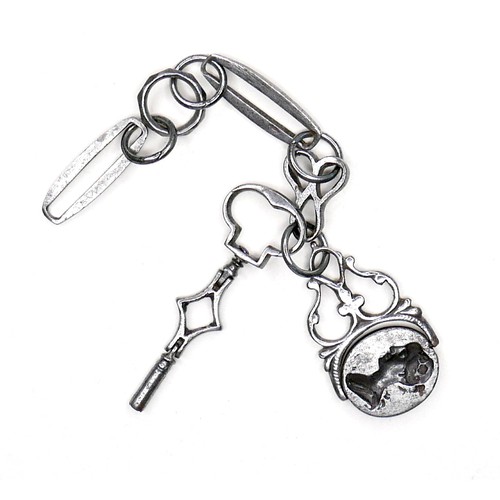 235 - A Georgian steel part fob chain, with hinged key, and cast swivel fob set with a double sided intagl... 