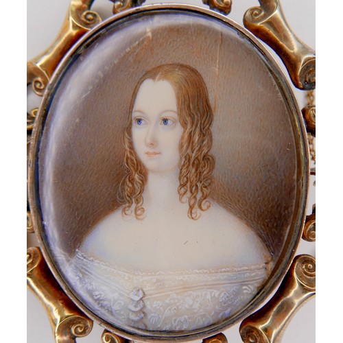 237 - A Victorian gold framed portrait miniature brooch, depicting a lady in white lace, silk backed, 5.3 ... 