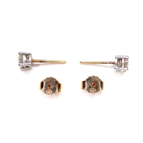 377 - A pair of diamond solitaire stud earrings, , each brilliant cut stone 4.9 by 3.4mm, 0.5ct, on 18ct w... 